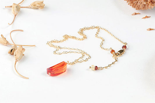 Natural Orange Sapphire on Gold